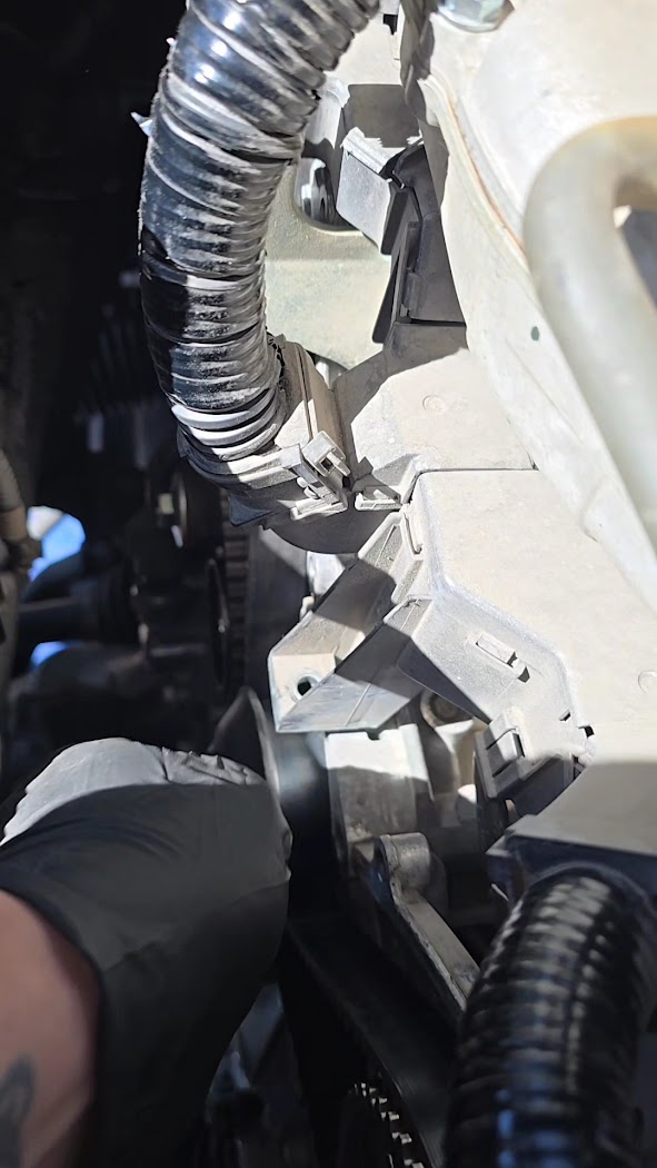 Close up of engine repair work in progress under the hood